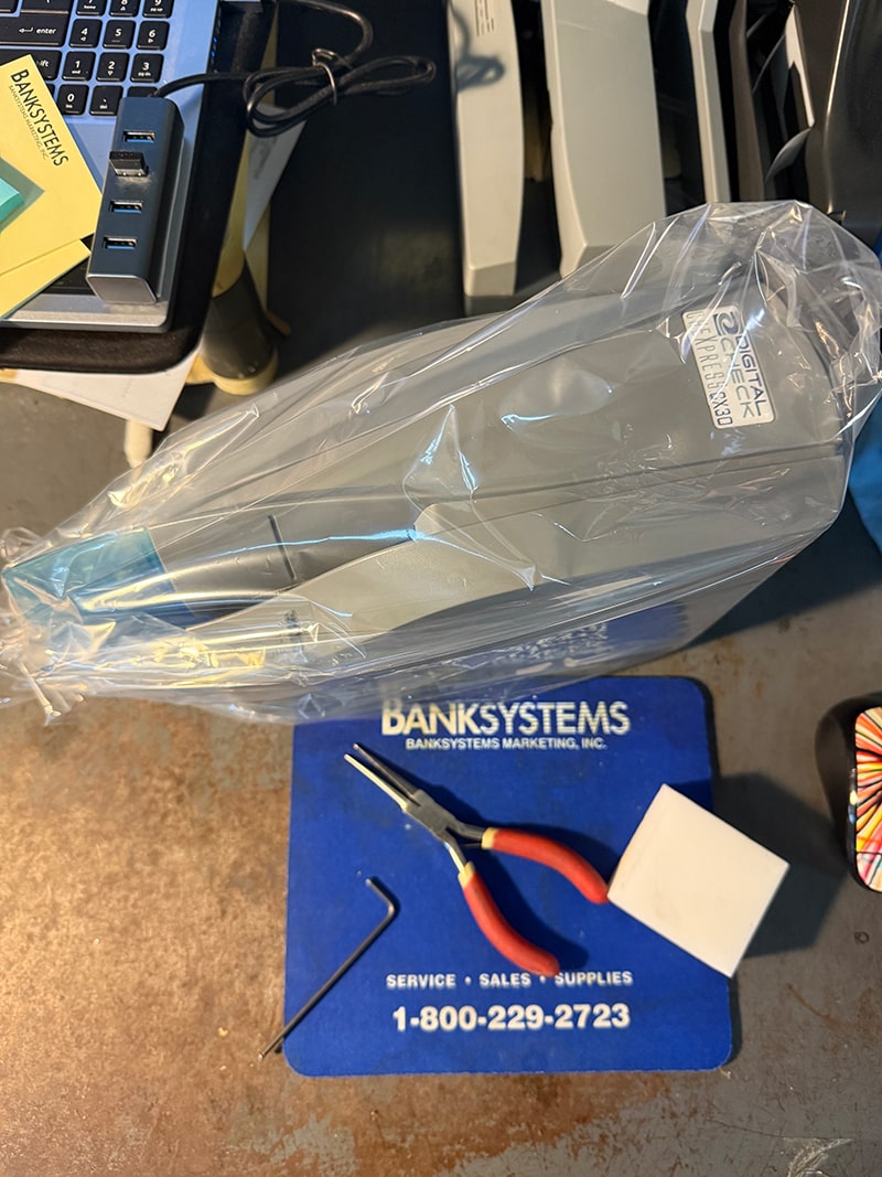 image of a refurbished check scanner by Bank Systems Marketing